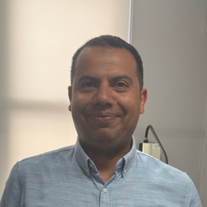 Dr Ahmed Radwan smiles at the camera